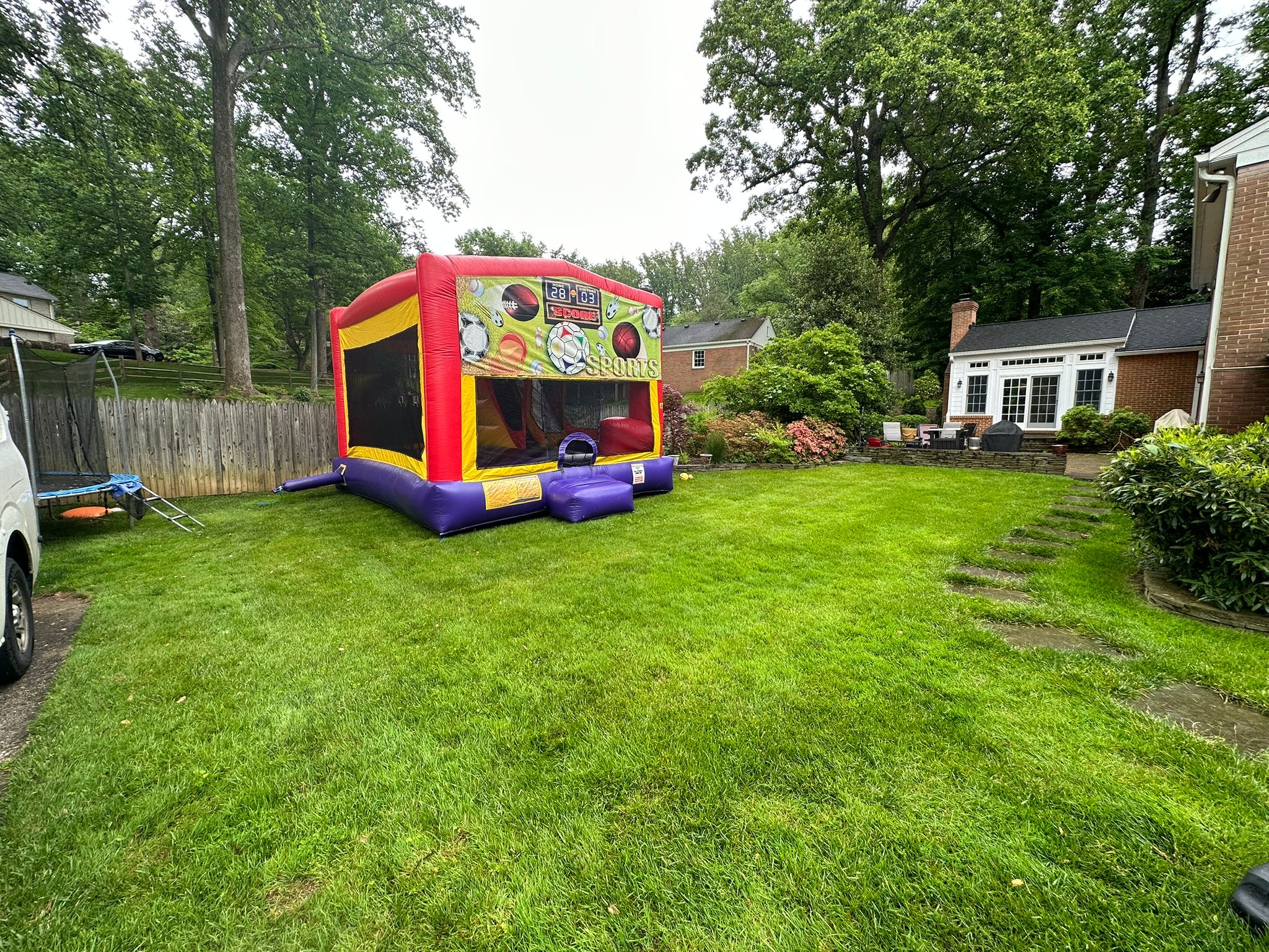A moon bounce combo in a Bethesda, MD backyard